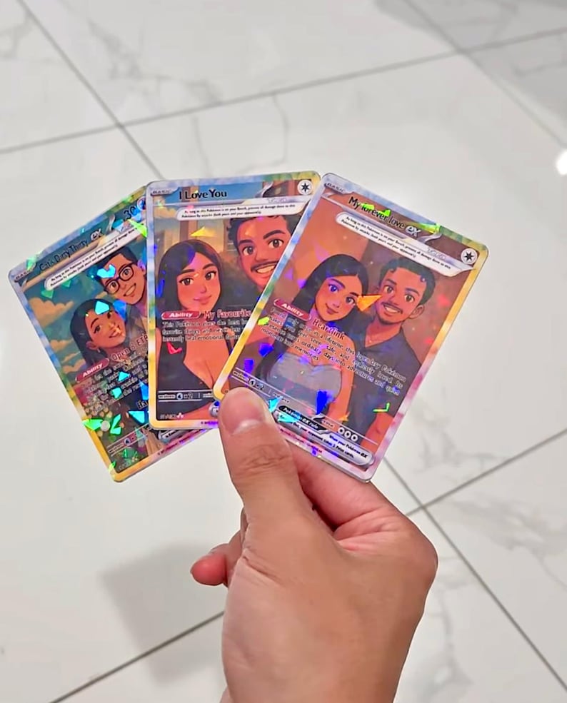 May include: Three rectangular trading cards featuring custom illustrated portraits of a couple. Each card has a holographic finish with text including "I Love You" and "My forever love EX". The cards display colorful cartoon-style artwork.