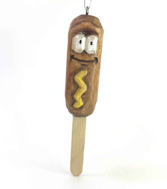 A hand-carved wooden corndog ornament — because someone out there needed a tiny holiday tribute to America's greatest stick-based food, and a real person made it.