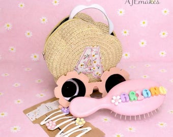 Beautiful personalised children’s small shoulder bag with personalised sunglasses, mirror, clips and hairbrush options for a gift set.