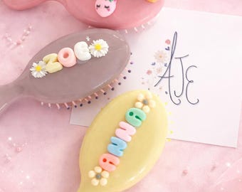 Personalised hairbrush. Children’s brush with name on. Pink  and purple personalised brush for little girls. Childrens brush with name on.