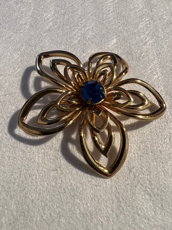 Gold Flower with blue stone brooch - image 1