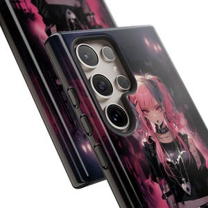 May include: A black phone case with a pink and black anime character design. The case has a camera bump with three lenses.