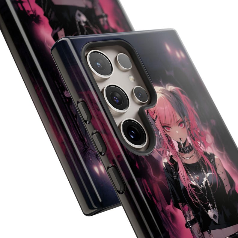 May include: A black phone case with a pink and black anime character design. The case has a camera bump with three lenses.