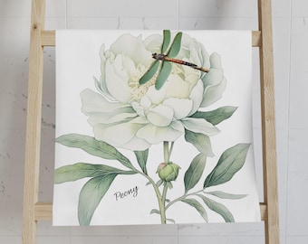 May include: A white peony flower with a green dragonfly on top. The flower is surrounded by green leaves and the word "Peony" is written below the flower.