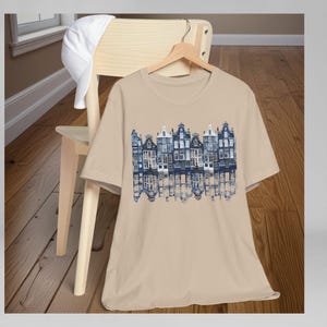 Unisex Amsterdam Tee Canal Houses Architecture Design Dutch Heritage Travel Gift Holland Souvenir Shirt Delft Blue Graphic Print Netherlands Culture Apparel Comfortable Cotton Jersey Casual Wear Top European Travel Present World Traveler