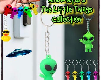 Alien Schlüsselanhänger Er leuchtet im Dunkeln in 5 Farben.