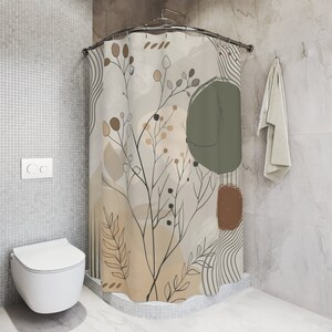 May include: A shower curtain with a beige background and a brown, green, and black abstract floral design. The design features stylised leaves and branches with small brown dots.