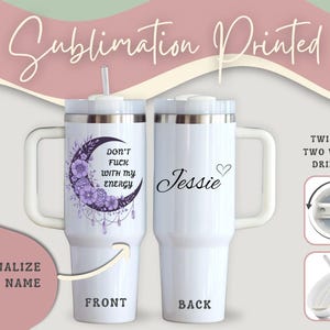 May include: White insulated tumbler with a handle, featuring a design on the front with a crescent moon, flowers, and the text "DON'T FUCK WITH MY ENERGY." The back displays the name "Jessie" with a heart. Includes a straw and twist lid.