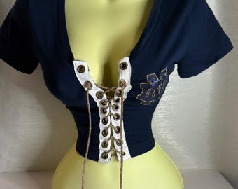 Top corto Notre Dame - Vinilo brillante