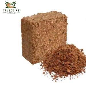 May include: A brown rectangular block of coco coir and a pile of loose coco coir. The product is for growing media. The logo at the top left says "TRUECOIRS 100% NATURAL ORGANIC GROWING MEDIA".