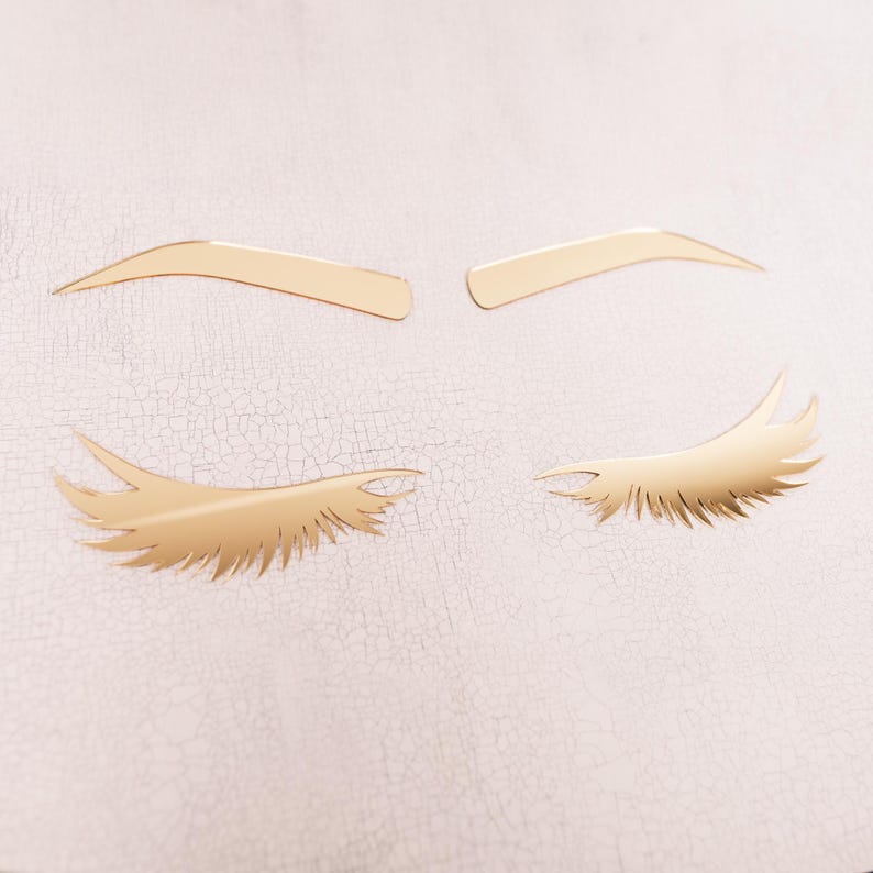 gold acrylic brow and lash beauty salon decor