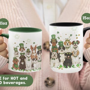 May include: Two white ceramic mugs with green rims. The 11oz mug features a group of dogs wearing shamrock hats and green collars. The 15oz mug features a similar group of dogs. Both mugs say "Save for HOT and COLD beverages".