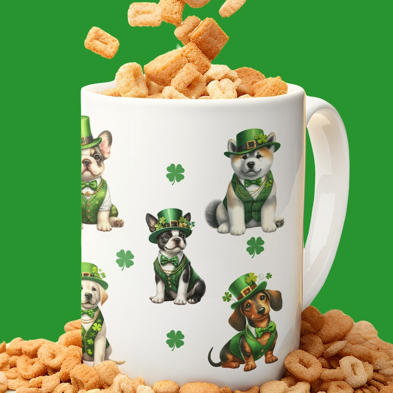 May include: White ceramic mug with a handle, featuring a green shamrock pattern and illustrations of dogs wearing green hats and vests. The mug is filled with cereal.