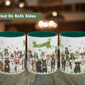 May include: A white ceramic mug with a green rim features a festive St. Patrick's Day design with a group of dogs wearing shamrock hats and holding shamrocks. The text "St. Patrick's Day" is printed on the mug. The mug is printed on both sides.