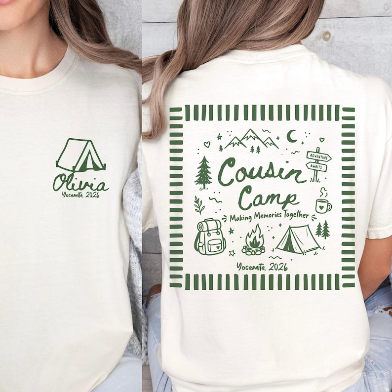 May include: A cream-coloured t-shirt featuring dark green graphics. The front displays a tent icon with the text Olivia Yosemite 2026. The back features a square frame containing the text Cousin Camp Making Memories Together Yosemite 2026.