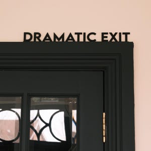 dramatic exit door topper wall shelf decor