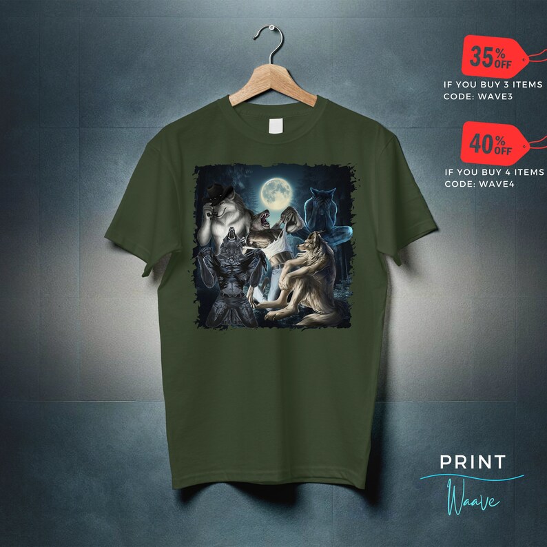 May include: Olive green t-shirt featuring a graphic of werewolves under a full moon. The design includes various werewolf figures in different poses. The shirt is hanging on a wooden hanger against a dark background. The text "PRINT Waave" is at the bottom.