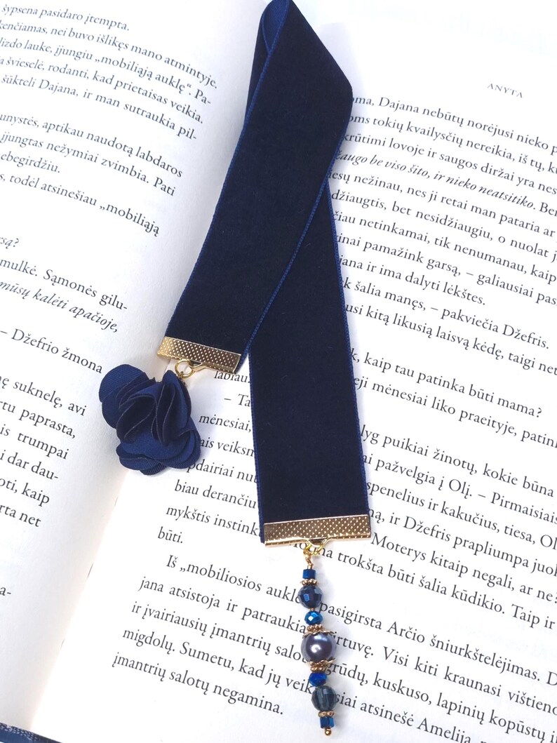 Dark blue bookmark with fabric flower and glass beads