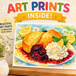May include: Art print featuring a watercolor illustration of a dessert with blackberries, whipped cream, and lemon slices. The print is on a white background with the text "ART PRINTS INSIDE!" and "BEAUTIFUL ART PRINTS TO BRIGHTEN YOUR SPACE!"