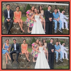 May include: A group of young people posing for a photograph outdoors. The group includes individuals wearing formal attire such as a white dress, black suits, and various colorful dresses, alongside others in casual shirts and pants, sitting on a stone wall.