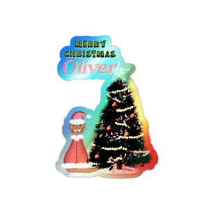 Autocollants holographiques découpés à l'emporte-pièce Oliver habillé en Père Noël par son sapin de Noël