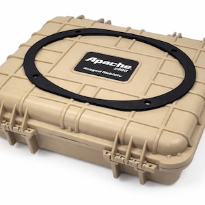 May include: Tan, rectangular Apache 2800 rugged mobility case with a black rubber gasket on top. The case has a textured surface, secure latches, and the Apache logo.