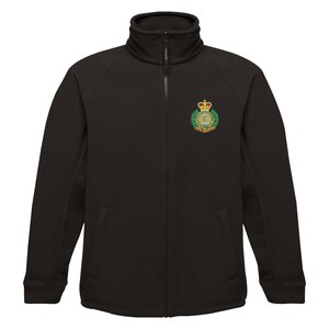 May include: Black fleece jacket with a full zip, high collar, and a crest on the upper left chest. The crest features a crown, wreath, and text in gold, green, and red. The jacket has two front pockets.
