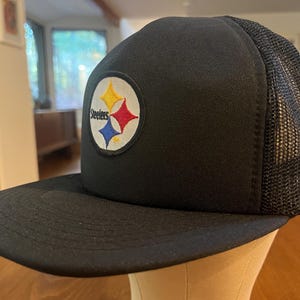 Vintage mid 1980s / early 1990s black on black AJD brand Pittsburgh Steelers snap-back trucker hat / cap - patch - one size fits all