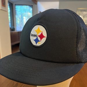 Vintage mid 1980s / early 1990s black on black AJD brand Pittsburgh Steelers snap-back trucker hat / cap - patch - one size fits all