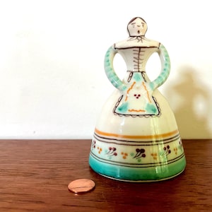 Campana spagnola vintage di medie dimensioni in ceramica bianca, blu e arancione - a forma di donna vestita in modo tradizionale - Spagna - eclettica - folk