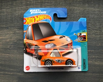 Toyota Supra '64 orange Mattel HOT WHEELS Tooned Fast & Furious 1:64 miniature car scale model collectible race movie