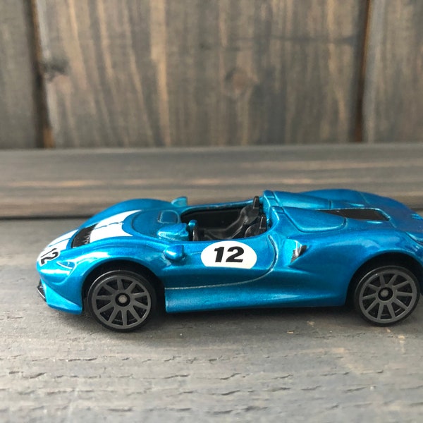 McLaren Elva Blue Mattel HOT WHEELS Exotics 1:64 miniature car scale model collectible toy classic supercar