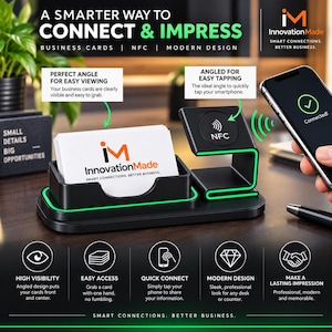 May include: A black business card holder with a green glowing edge, featuring a slot for cards and an integrated NFC tapping station. The holder displays a stack of white business cards with the InnovationMade logo and text on the front.