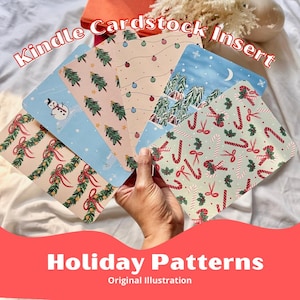May include: Kindle cardstock inserts with holiday patterns. Designs include Christmas trees, snowmen, candy canes, and string lights. The text "Holiday Patterns" and "Original Illustration" are also visible.