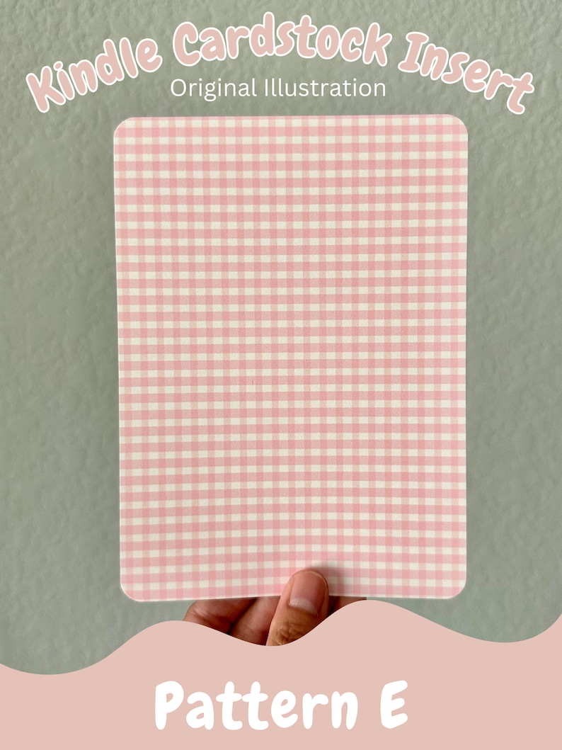 May include: A pink and white gingham pattern cardstock insert for a Kindle. The insert is held in a hand and the text "Pattern E" is visible below the insert.