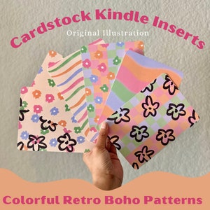 May include: Six colorful cardstock inserts with different retro boho patterns. The patterns include flowers, stripes, and checkered designs. The text "Cardstock Kindle Inserts" and "Original Illustration" is at the top of the image. The text "Colorful Retro Boho Patterns" is at the bottom of the image.