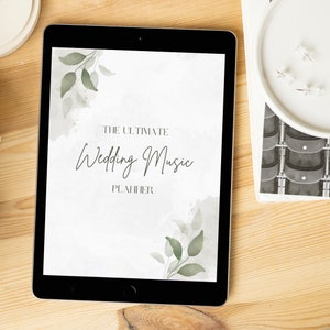 May include: A digital tablet displaying a printable wedding music planner with a watercolor background and green leaves. The text on the screen reads "The Ultimate Wedding Music Planner".