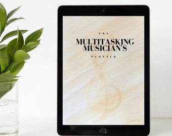May include: A digital tablet displaying a digital planner cover with the text "The Multitasking Musician's Planner" on a beige background with a treble clef symbol.
