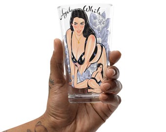 May include: A clear glass with a printed image of a woman in a black lingerie set with the text "Angela White" on the glass.