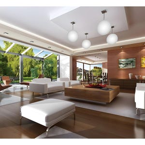 May include: A spacious living room featuring white upholstered sofas and a matching ottoman, a large square wooden coffee table, and four spherical pendant lights hanging from a recessed ceiling. The room includes wood paneling and glass walls.