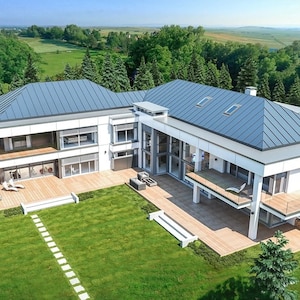 Top view of a modern L-shaped house with large terraces and an open layout, surrounded by greenery. Perfect for modern architectural plans.