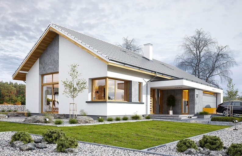 Front view of a modern Scandinavian house with a gable roof, large driveway, and elegant landscaping. This home is designed for comfort and includes architectural floor plans and tiny home inspiration.
