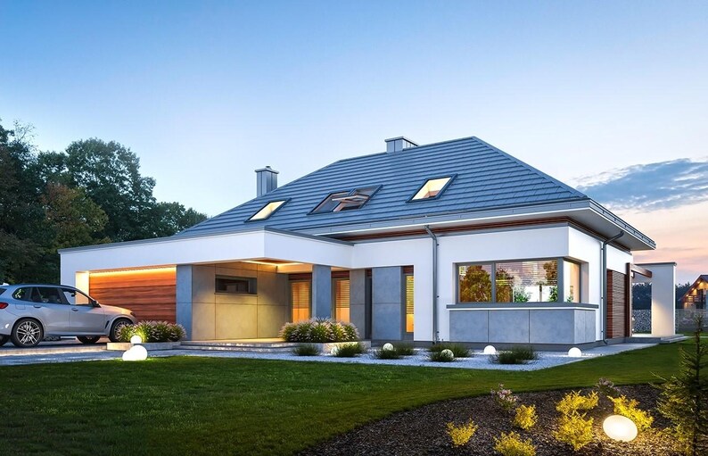May include: A modern one-story house with a blue tiled roof, white walls, and wood paneling accents. The exterior features large windows, a covered entrance, and a silver car parked on the side. The front yard has green grass and lights.