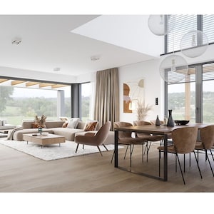 Spacious dining room with stylish pendant lights, a large wooden table, and views of the greenery through glass doors. Ideal for a plan maison or contemporary home design.