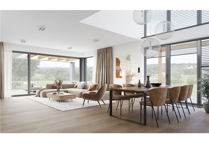 Spacious dining room with stylish pendant lights, a large wooden table, and views of the greenery through glass doors. Ideal for a plan maison or contemporary home design.