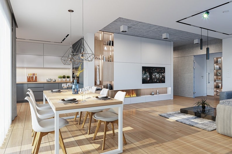 A chic dining area connected to an open kitchen, featuring Scandinavian design elements and a contemporary aesthetic. Perfect for modern house plans.