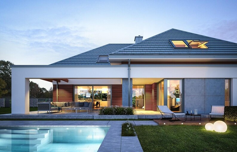 May include: A modern single-story house with a gray tiled roof, white exterior walls, and large glass sliding doors. The home features a covered patio with outdoor seating, a swimming pool in the foreground, and a lawn with glowing spherical lights.
