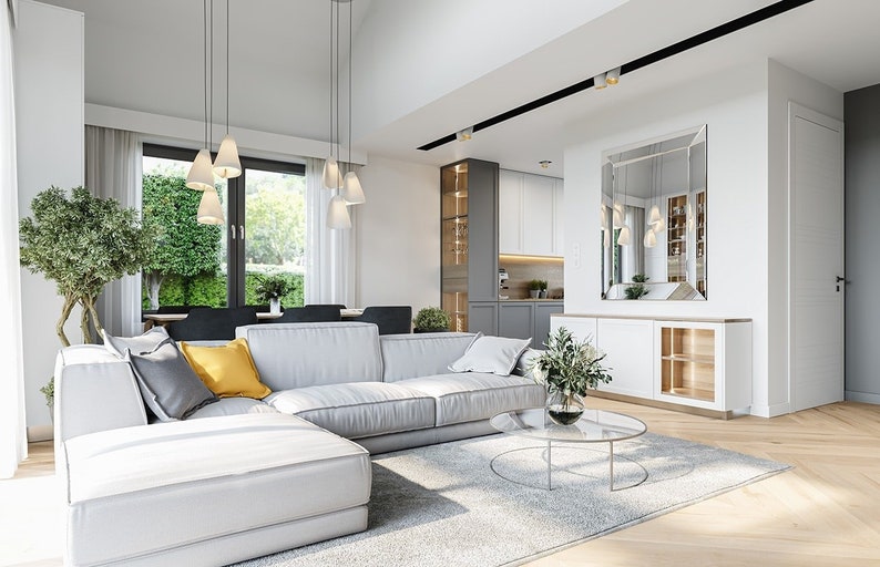 Living Room:
Bright and modern living room with a vaulted ceiling, fireplace, and natural wood elements, creating a warm and open atmosphere for family gatherings.