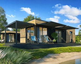 May include: A modern, wood-sided cabin with a black roof and a covered patio. The cabin has large windows and a deck with two chairs. The cabin is surrounded by green grass and a small pond.