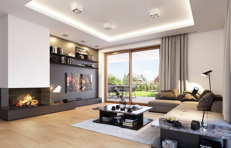 Interior view of a spacious living room with modern furnishings and a cozy fireplace. Perfect for tiny home or cottage house plans with open living spaces.